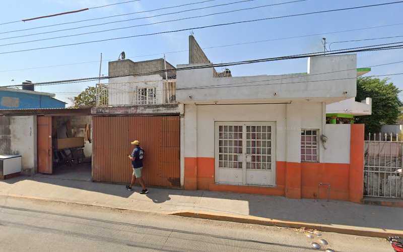 Fotografia tomada fuera de Panadería la Flor de Azucar - Panadería en El Porvenir, Nay.